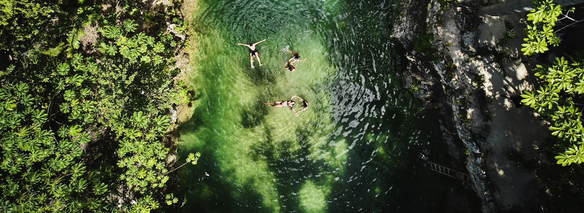 People in water park (in waterfall)